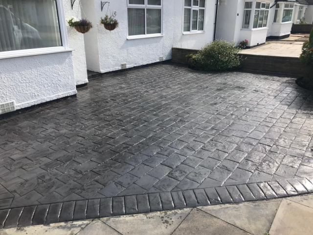 New pattern imprinted concrete driveway